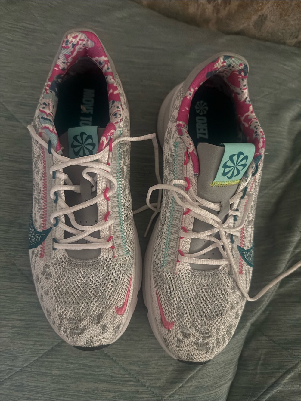 Nike Women's White Athletic Sneakers with Teal & Pink Accents - Picture 2 of 3